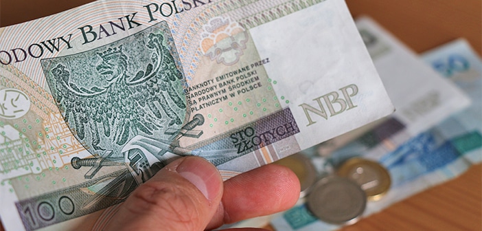Dinheiro na Polônia: qual moeda levar e como fazer câmbio e saques